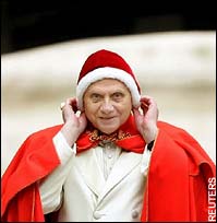 The Pope in the red, fur-lined hat he wore at Christmas